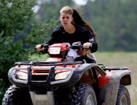 Justin Bieber and Celena Gomez riding an ATV before MVA
