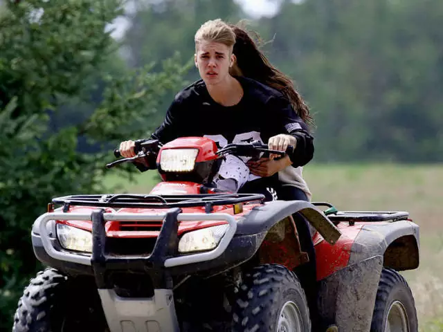 Justin Bieber and Celena Gomez riding an ATV before MVA